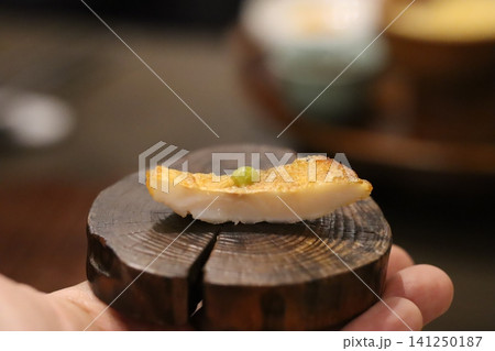 Crispy Fish Slice with Pea on Wooden Base Crispy Fish Slice with Pea on Wooden Base 141250187