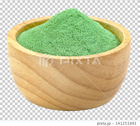 Fine green matcha or spirulina powder in a small wooden bowl isolated. Organic superfood ingredient for healthy drinks, smoothies, and herbal wellness. Professional studio shot. Fine green matcha or spirulina powder in a small wooden bowl isolated. Organic superfood ingredient for healthy drinks, smoothies, and herbal wellness. Professional studio shot. 141251891