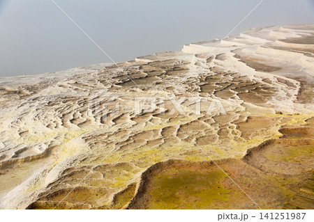 Carbonate travertines the natural pools during. Turkey Carbonate travertines the natural pools during. Turkey 141251987