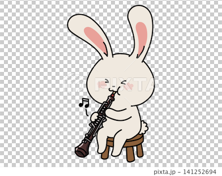 A cute girl playing the oboe A cute girl playing the oboe 141252694