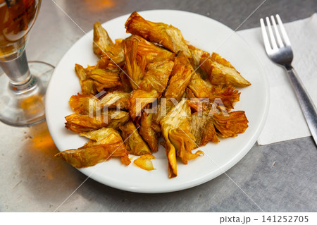 Tasty fried artichokes at white plate, nobody 141252705