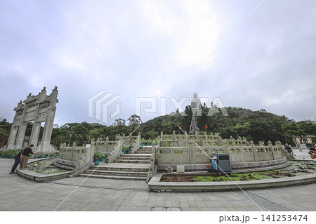 Hong Kong June 27 2026 misty Big Buddha from temple plaza 141253474