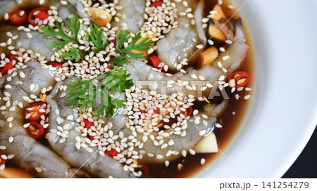 shrimp in soy sauce on white plate, korean style menu 141254279