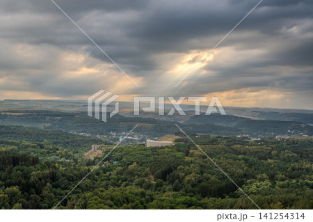 View of the mountains and Kislovodsk from the observation decks of the Kislovodsk Park. Evening sunset over the mountains of Kislovodsk. View of the mountains and Kislovodsk from the observation decks of the Kislovodsk Park. Evening sunset over the mountains of Kislovodsk. 141254314
