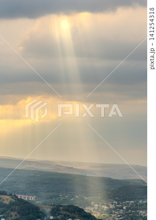 Layers of green mountains and hills in the haze during sunset. Panoramic View of Green hills and Meadow. Layers of green mountains and hills in the haze during sunset. Panoramic View of Green hills and Meadow. 141254318