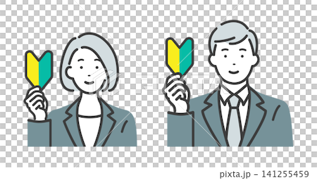 A young man and woman in suits, both holding beginner driver stickers. A young man and woman in suits, both holding beginner driver stickers. 141255459