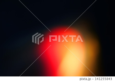 Soft bokeh glowing light effects with vibrant red, orange, and warm lens flare overlays Soft bokeh glowing light effects with vibrant red, orange, and warm lens flare overlays 141255843