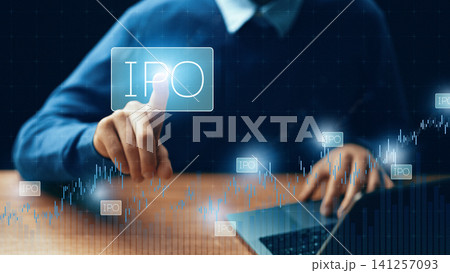 Interest in Initial Public Offering IPO on a laptop screen during a business meeting in a modern office setting Interest in Initial Public Offering IPO on a laptop screen during a business meeting in a modern office setting 141257093