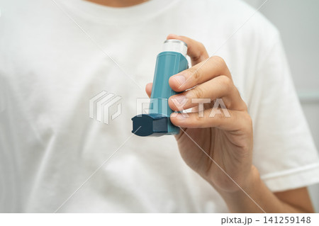 Asthma and chronic obstructive pulmonary disease COPD, Asian teenage using metered dose inhaler MDI. 141259148