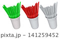 Multiple colorful plastic straws arranged in plastic cups isolated on white background, symbolizing party beverages 141259452