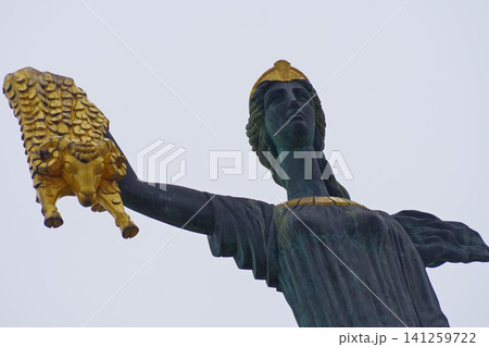 Golden Fleece and Medea statue in Batumi with sky copy space Golden Fleece and Medea statue in Batumi with sky copy space 141259722