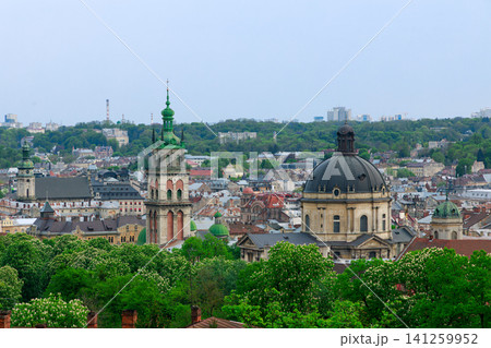 Panoramic view of Lviv historic cityscape with iconic domes and towers showcases the rich architectural heritage Panoramic view of Lviv historic cityscape with iconic domes and towers showcases the rich architectural heritage 141259952