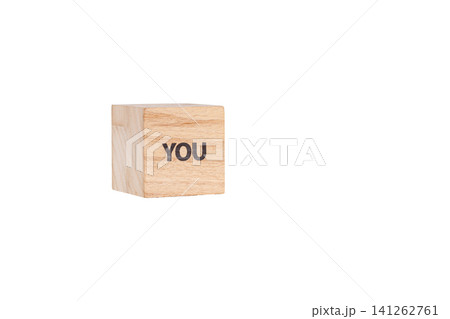 wooden cubes with the inscription You on a white isolated background wooden cubes with the inscription You on a white isolated background 141262761
