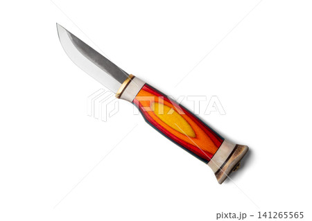 hunting knife with steel blade and handle made of birch wood. Traditional handmade equipment for survival, camping, hiking, bushcraft and outdoor activity. Isolated object. hunting knife with steel blade and handle made of birch wood. Traditional handmade equipment for survival, camping, hiking, bushcraft and outdoor activity. Isolated object. 141265565