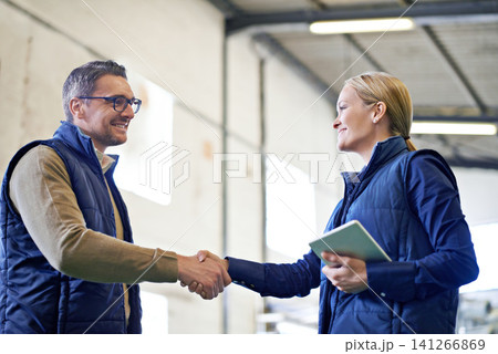 Welcome, deal and business people with handshake for partnership, distribution or agreement. Professional, technology and shaking hands for export support, b2b networking or onboarding in warehouse Welcome, deal and business people with handshake for partnership, distribution or agreement. Professional, technology and shaking hands for export support, b2b networking or onboarding in warehouse 141266869