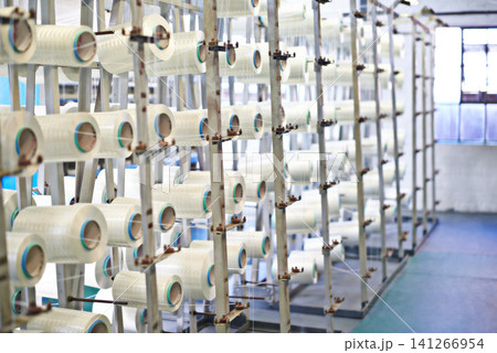 Spool, stock and product manufacturing with warehouse, industry and supply chain for storage. Industrial plant, factory and logistics for freight, commercial distribution and equipment supplier cargo 141266954