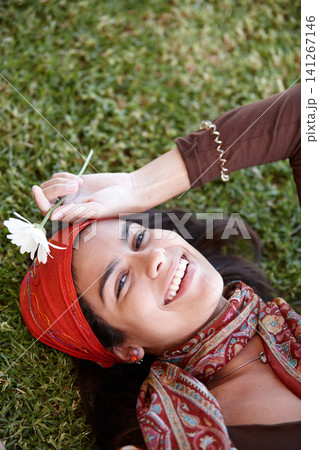 Woman, smile and flower outdoor for gypsy with plant in nature for summer and rest in garden. Young person, lady or boho and lay on grass for bohemian style, fun and free spirit in spring and above Woman, smile and flower outdoor for gypsy with plant in nature for summer and rest in garden. Young person, lady or boho and lay on grass for bohemian style, fun and free spirit in spring and above 141267146