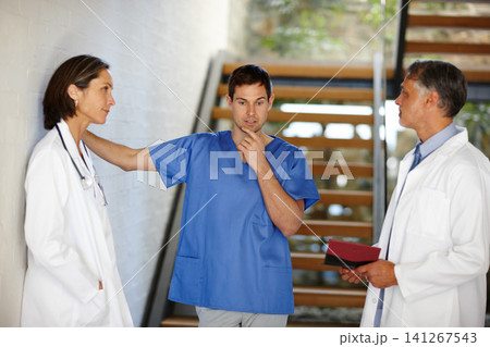 Medical, team and conversation with thinking people, hospital nurse and doctor in discussion for patient result. Health, collaboration or consulting surgeon for help, healthcare idea or brainstorming 141267543
