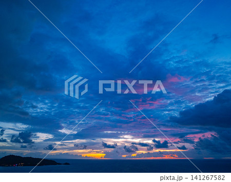 Aerial view beautiful pink cloud in sunset above Patong beach. 141267582