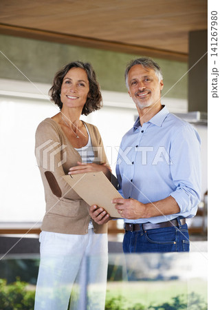 Portrait, happy couple and documents in home for budget, investment and mortgage. Smile, mature man and woman with mail for savings, asset management and financial planning together in apartment Portrait, happy couple and documents in home for budget, investment and mortgage. Smile, mature man and woman with mail for savings, asset management and financial planning together in apartment 141267980