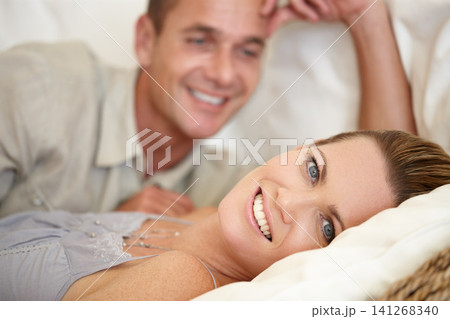 Couple, smile and portrait in bed on weekend, relax and support or hotel for bonding. Happy people, commitment and romance for date in bedroom, peace and affection for connection in relationship Couple, smile and portrait in bed on weekend, relax and support or hotel for bonding. Happy people, commitment and romance for date in bedroom, peace and affection for connection in relationship 141268340