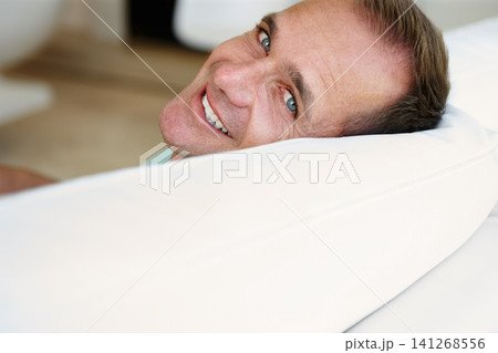 Portrait, man or sofa to relax at weekend in peace, health or wellness as easy, self care or holiday. Tired, happy or mature male person on couch as lazy, break or comfort as rest and relaxation Portrait, man or sofa to relax at weekend in peace, health or wellness as easy, self care or holiday. Tired, happy or mature male person on couch as lazy, break or comfort as rest and relaxation 141268556