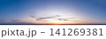 Dramatic twilight sky panorama view with clouds drifting in the evening. 141269381