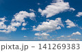 Wide angle panorama of beautiful sky with cumulus clouds  over a clear horizon. 141269383