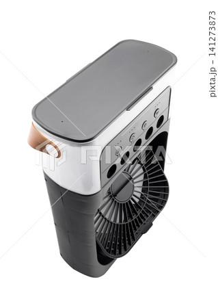 mini air conditioner top angle view with leather strap on the side on white background mini air conditioner top angle view with leather strap on the side on white background 141273873