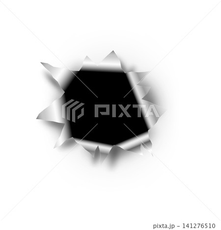 A hole punched through a wall or paper with sharp, curved edges. A hole punched through a wall or paper with sharp, curved edges. 141276510