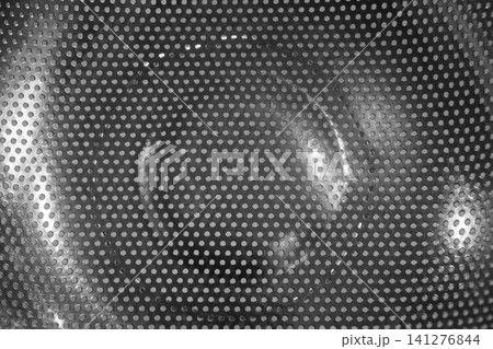 Metal texture with multiple wholes - background 141276844