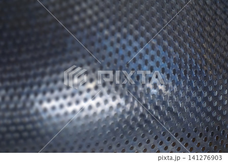 Metal texture with multiple wholes - background Metal texture with multiple wholes - background 141276903