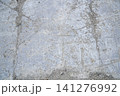 Grey concrete surface with many scratches Grey concrete surface with many scratches 141276992