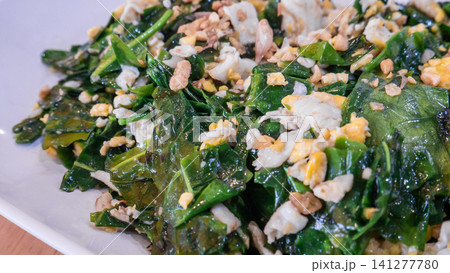 Traditional Southern Thai Stir Fried Melinjo Leaves with Egg 141277780