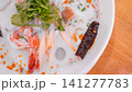 Creamy Thai Coconut Tom Yum Seafood Soup 141277783