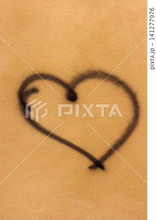 Hand drawn heart symbol on textured plaster wall Hand drawn heart symbol on textured plaster wall 141277976