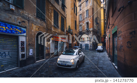 GENOA, ITALY - NOVEMBER 04, 2018 - Narrow streets of the old city GENOA, ITALY - NOVEMBER 04, 2018 - Narrow streets of the old city 141278770