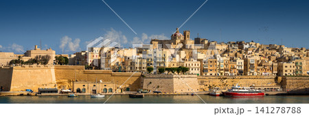 VALLETTA, MALTA - NOVEMBER 12, 2018 - In bay The Grand Harbor Tricity of Valletta, Birgu and Senglea on the island Malta VALLETTA, MALTA - NOVEMBER 12, 2018 - In bay The Grand Harbor Tricity of Valletta, Birgu and Senglea on the island Malta 141278788