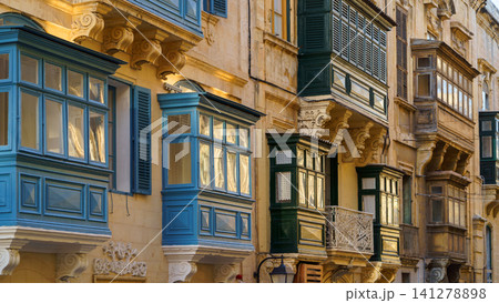 Typical Maltese covered balconies in Valetta, Malta 141278898