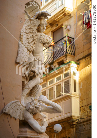 VALLETTA, MALTA - NOVEMBER 12, 2018 - Ancient statues of the city VALLETTA, MALTA - NOVEMBER 12, 2018 - Ancient statues of the city 141278900