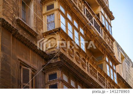 Typical Maltese covered balconies in Valetta, Malta 141278903