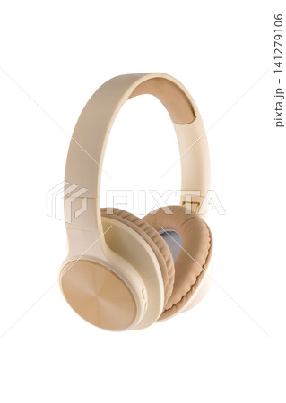 beige wireless headphones close up on a clean white background in half turn to the right beige wireless headphones close up on a clean white background in half turn to the right 141279106