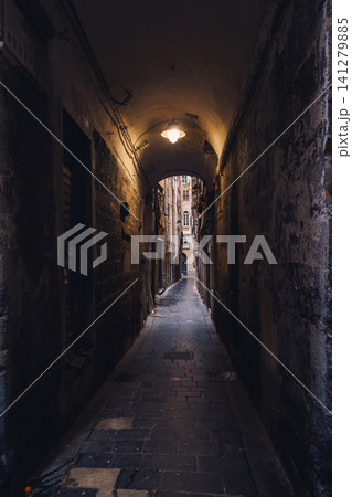 GENOA, ITALY - NOVEMBER 04, 2018 - Narrow streets of the old city GENOA, ITALY - NOVEMBER 04, 2018 - Narrow streets of the old city 141279885