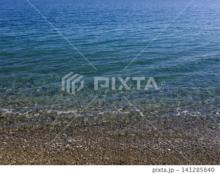 Clear turquoise waters and beautiful sandy beach of the mediterranean Clear turquoise waters and beautiful sandy beach of the mediterranean 141285840