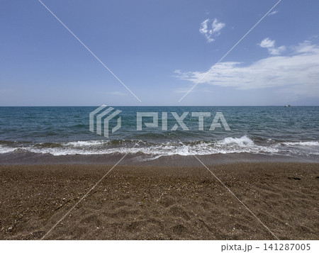 Scenic sunset with calm sea and dramatic clouds 141287005