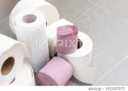 Rolls Of Toilet Paper Towels Hygiene. Roll on gray background Rolls Of Toilet Paper Towels Hygiene. Roll on gray background 141287073