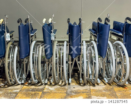 Lot of wheelchairs in the hospital Lot of wheelchairs in the hospital 141287545