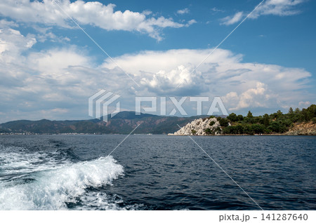 White rocky cliffs and green mountains in Marmaris Turkey 141287640