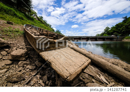 a boat by reservoir a boat by reservoir 141287741