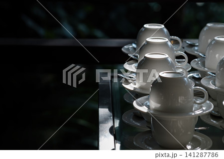 many coffee cup set up for tea break in business meeting conference refreshing up in afternoon sunshine many coffee cup set up for tea break in business meeting conference refreshing up in afternoon sunshine 141287786